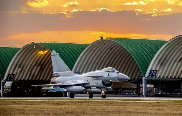 A Chinese air force J-10 taxis near a hangar last November 8. [Chinese Ministry of Defence]