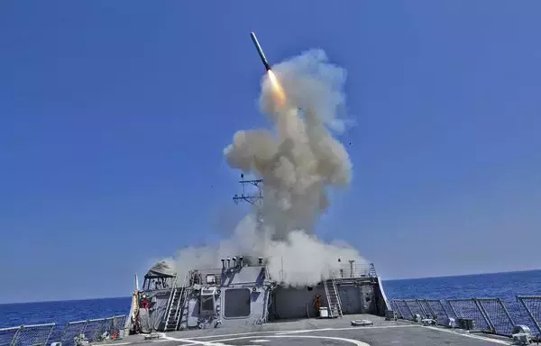 An Arleigh Burke-class destroyer launches a Tomahawk cruise missile. [US Navy]