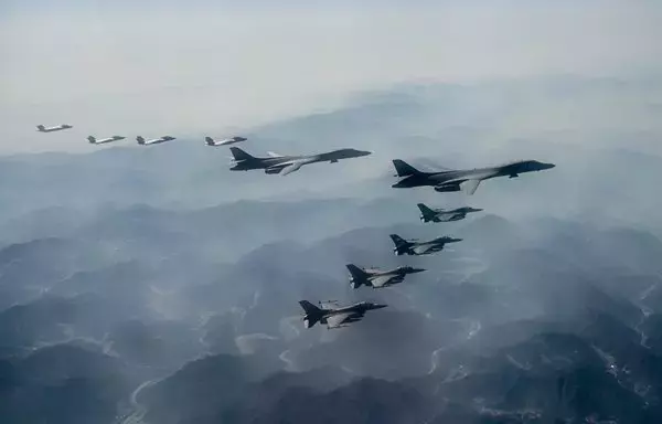 Two US Air Force B-1B Lancers and four F-16 Falcons participate in a combined aerial exercise alongside four South Korea Air Force F-35 Lighting IIs over South Korea, March 19. [US Air Force]