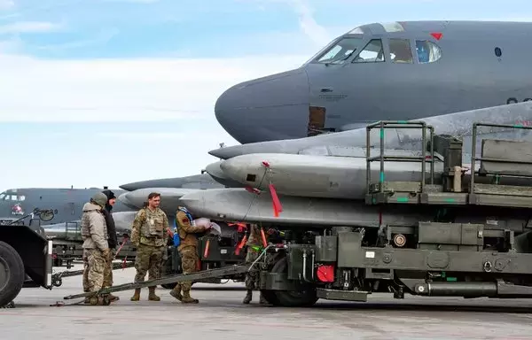 A US Air Force B-52H Stratofortress assigned to the 5th Bomb Wing is prepared for loading of air-launched cruise missiles during Global Thunder 23 at Minot Air Force Base in North Dakota April 12. [US Air Force]