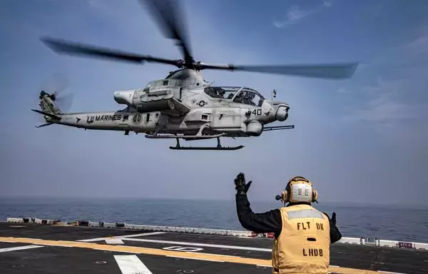 An AH-1Z Venom helicopter takes off from the amphibious assault ship USS Makin Island on March 29. [US Navy]