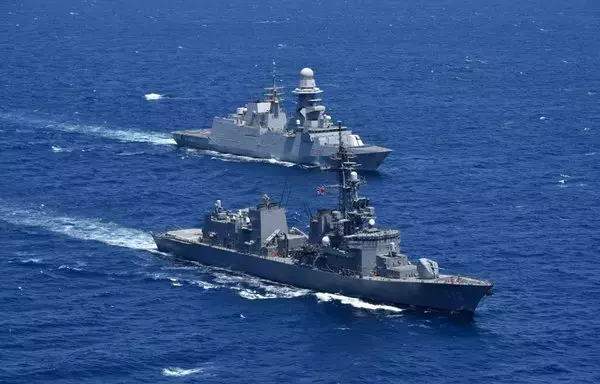 Japanese Maritime Self-Defence Force destroyer JS Makinami sails alongside Italian Navy frigate ITS Carlo Bergamini in the Gulf of Aden during combined training between Combined Maritime Forces and European Union Naval Forces on April 8. [Courtesy photo/US Navy]