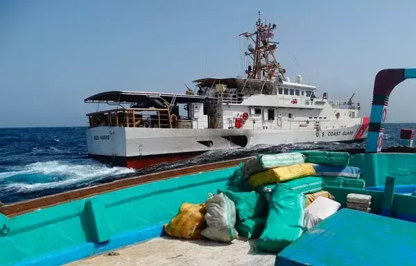 Bags of illegal drugs sit on the deck of a fishing vessel seized by a US Coast Guard fast response cutter operating as part of Combined Task Force 150 in the Gulf of Oman on May 8. [US Navy]