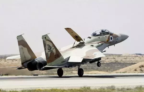 An Israeli air force F-15I fighter jet lands at the Hazerim Air Force Base, in the southern Israeli Negev desert, on March 30, 2009. [Jack Guez/AFP]