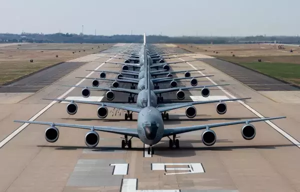 Sixteen KC-46A Pegasus and five KC-135 Stratotankers line up for an elephant walk during exercise Lethal Pride at McConnell Air Force Base in Kansas March 27. [US Air Force]
