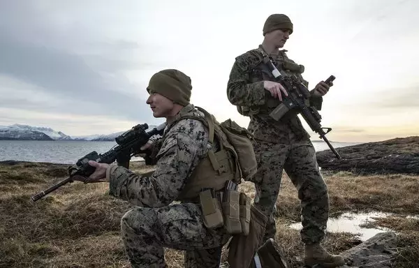 US Marine Corps members of the II Marine Expeditionary Force pose during Exercise Cold Response 2022 in Bodo, Norway, March 9, 2022. The exercise included forces from 27 countries including Norway. [US Marine Corps/Sgt. Megan Roses]