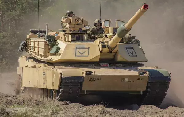 A US Army M1A2 Abrams tank maneuvers during Exercise Anakonda23 in Nowa Deba, Poland, May 14. [US Army Sgt. 1st Class Theresa Gualdarama/US National Guard]