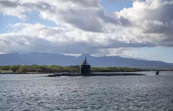 The Los Angeles-class fast-attack submarine USS Columbia gets under way from Joint Base Pearl Harbor-Hickam in preparation for an exercise on October 13. [US Navy]
