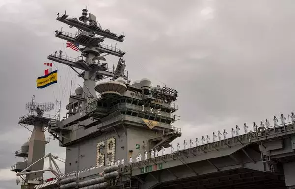 The Nimitz-class aircraft carrier USS Dwight D. Eisenhower deploys from Naval Station Norfolk on October 14. [US Navy]