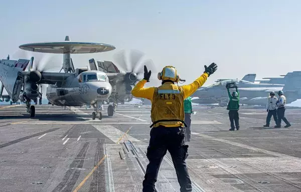 Personnel on the USS Eisenhower in a photo posted on November 11. [US Navy]