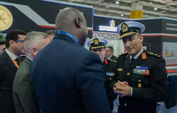 Maj. Gen. Ashraf Ibrahim Atwa Megahed, Commander of the Egyptian Naval Forces, speaks with US defense contractors at EDEX 2023. [File]
