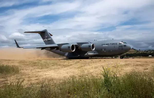 A US Air Force C-17 Globemaster III participating in Exercise Golden Phoenix takes off on a dirt runway in California on May 9, 2023. [US Air Force]