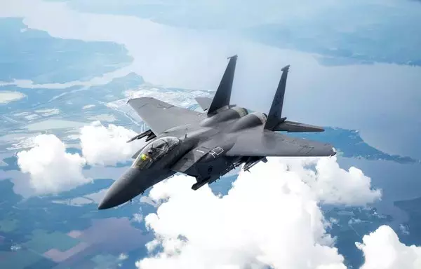An F-15E Strike Eagle departs after receiving fuel from a KC-135 Stratotanker, over the northeastern United States, August 24, 2022. [US Air Force]