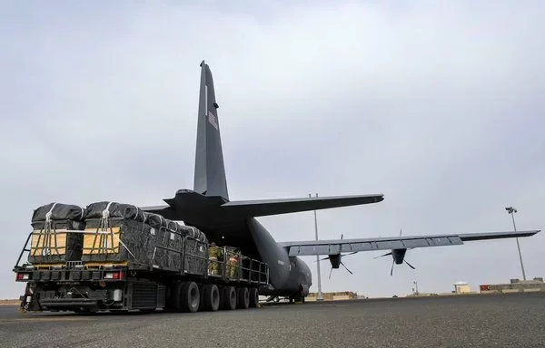 Bundles of humanitarian aid destined for Gaza are loaded onto the US Air Force C-130J Super Hercules at an undisclosed location within the US Central Command area of responsibility on April 28. [US Air Force]