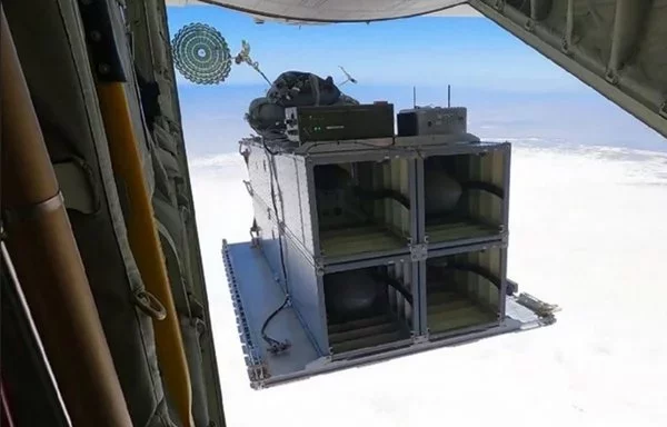 Rapid Dragon Operational Prototype, which was integrated on a US Marine Corps KC-130. Shown is a heterogeneous loadout flight test from a demonstration in April 2023. [Courtesy of Air Force Research Laboratory]