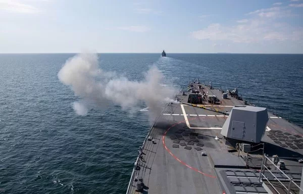 An Mk 45 is fired on the fo'c'sle of the Arleigh Burke-class guided-missile destroyer USS Roosevelt during a live fire exercise July 7, 2023. [US Navy]