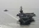 The USS Theodore Roosevelt is one of 10 Nimitz-class nuclear-powered aircraft carriers, capable of carrying large numbers of US personnel, weapons and pieces of equipment.