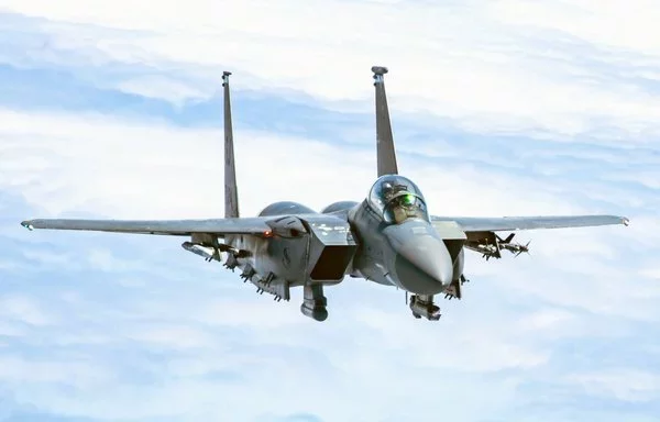 An F-15E Strike Eagle approaches a KC-135 Stratotanker to be refueled over the skies of North Carolina, May 7. [US Air National Guard]