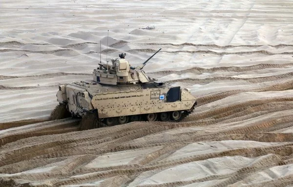 An M2A3 Bradley Fighting Vehicle moves into position to conduct a firing system check at the Presidenski Range in Trzebień, Poland, on September 20, 2017. [US Army]