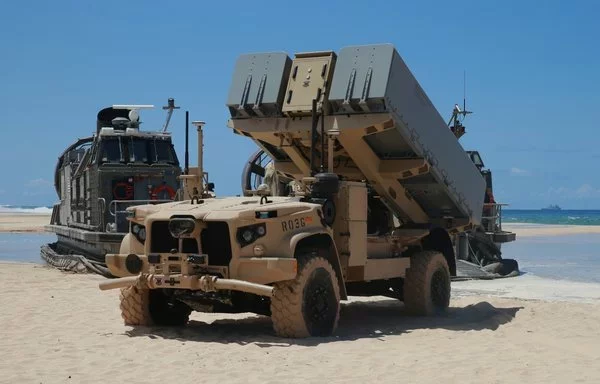 A Navy Marine Expeditionary Ship Interdiction System (NMESIS) launcher deploys into position at Pacific Missile Range Facility Barking Sands on August 18, 2021. [US Marine Corps]