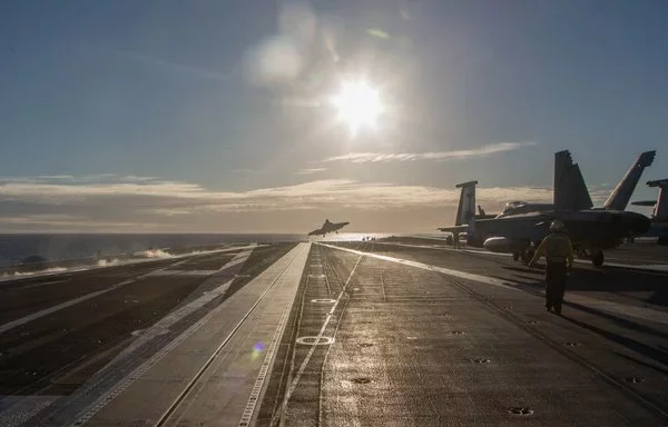 An F-35C Lightning II, assigned to Marine Wing Fighter Attack Squadron 314, launches from the flight deck of the aircraft carrier USS Abraham Lincoln. [US Navy]