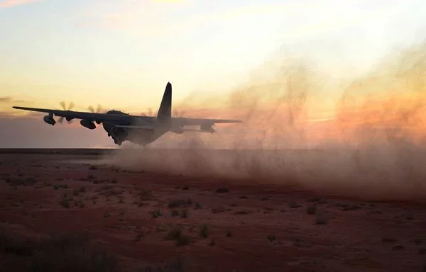 Leaving a trail of dust in its wake, an MC-130J Commando II takes off April 2, 2015, at Melrose Air Force Range in New Mexico. The aircraft's crew demonstrated its capability to take off, land and perform air drops in remote areas during a joint exercise. [US Air Force]