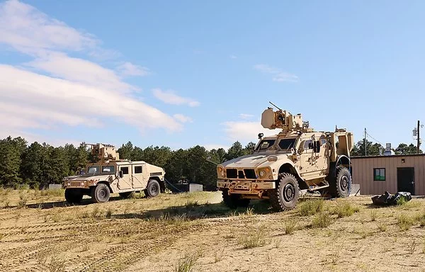 Drone-fighting BLADE prototypes are mounted on trucks during an engineering test in June 2019 at Fort Dix, New Jersey. [US Army]