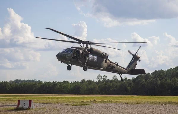 A UH-60 Black Hawk prepares to land before heading to the forward arming and refueling point at Fort Johnson in Louisiana, September 18. [US Army]