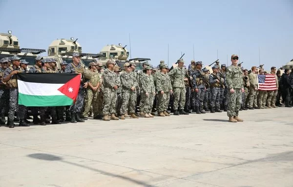 US and Jordanian naval personnel stand in formation during the opening ceremony for Eager Lion 24 at Aqaba, Jordan, May 12. [US Army]