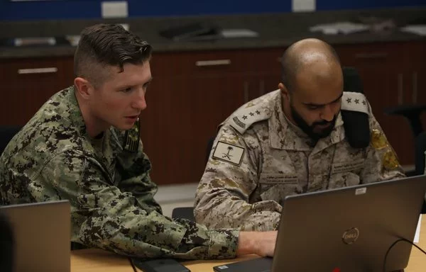 Members of the US and Saudi armed forces work together during the command post exercise as part of Eagle Resolve 2, June 1, 2023, in Saudi Arabia. [US Army]