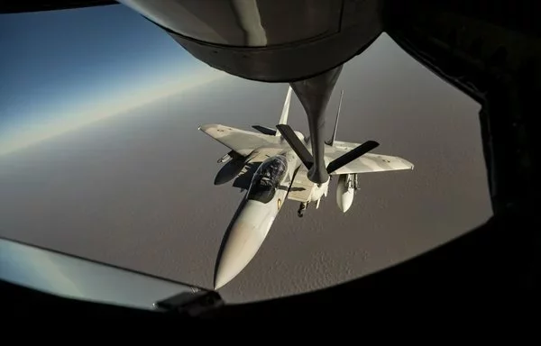 A Qatar Emiri Air Force F-15E Strike Eagle prepares to make contact with a US Air Force KC-135 Stratotanker on November 18. [US Air Force]