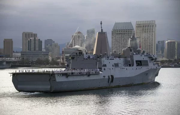 The San Antonio-class amphibious transport dock USS Anchorage transits San Diego Bay upon returning to home port following a seven-month deployment in June 2023. A HIMARS was fired on the flight deck of the USS Anchorage in October 2017, demonstrating the capabilities of SLASH. [US Navy]