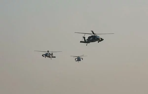 US Army UH-60 Black Hawk helicopters prepare to land during arrival for the Desert Talon exercise in US Central Command's area of responsibility on December 14. [US Army]