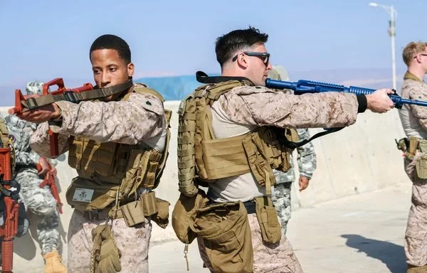 US Marines demonstrate room clearing techniques for close quarter combat training during International Maritime Exercise 2025 in Aqaba, Jordan, February 16. IMX25 is the largest multinational training event in the Middle East, involving 5,000 personnel from more than 35 nations and international organizations committed to preserving the rules-based international order and strengthening regional maritime security cooperation. [US Army]