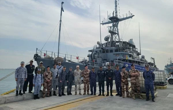 International Maritime Exercise 2025 participants tour the Avenger-class mine countermeasure ship USS Devastator (MCM 6). IMX is the largest multinational training event in the Middle East, involving 5,000 personnel from more than 35 nations and international organizations committed to preserving the rules-based international order and strengthening regional maritime security cooperation. [US Navy]