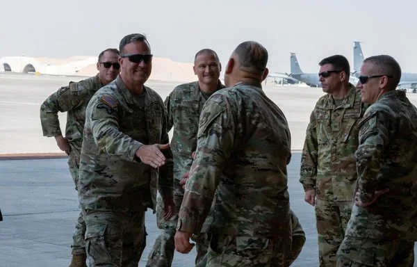 CENTCOM Gen. Michael "Erik" Kurilla greets an airman at an undisclosed location within the CENTCOM area of responsibility, November 15, 2023. [US Air Force]