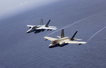Stealth plus firepower: F-35C and Super Hornet form powerful duo