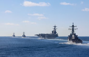 Carrier Strike Group destroyers deliver layered defense and global strike capability